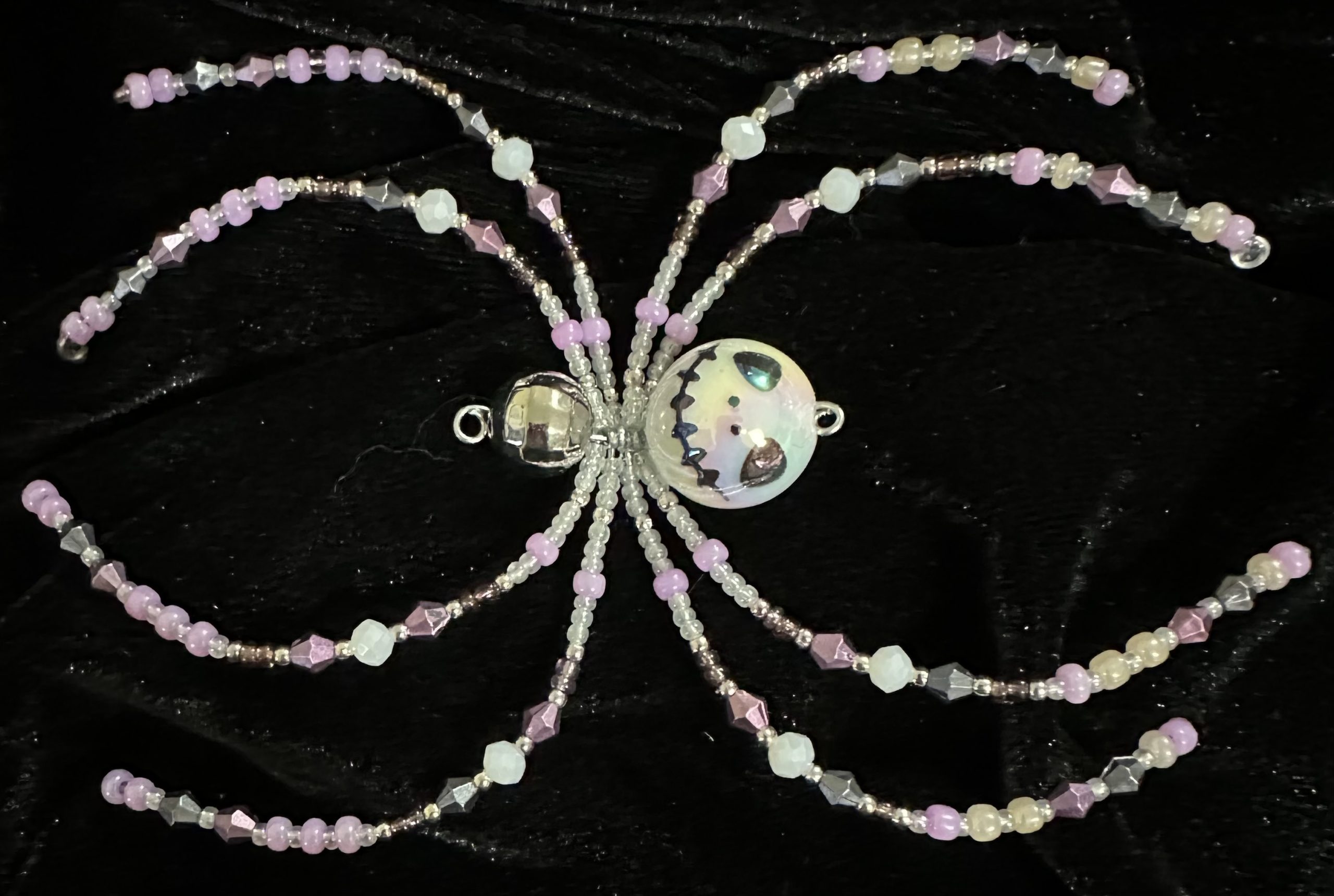 Halloween themed beaded spider with a skeleton face body - Image 3