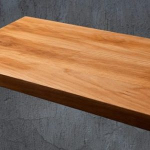 Wooden cutting board on a stone surface with additional views and product details.